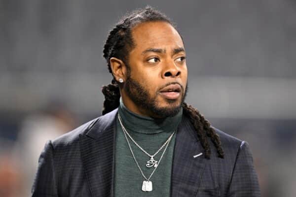 The gunmen are divided into the house of former Seahawks player, Richard Sherman, with family inside