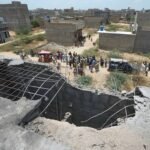 Photo: You can see a great hole on a roof of a house suspected of having been damaged in the Indian Pakistan Air Defense System of Pakistan knocked down an alleged Indian drone in Karachi, Pakistan, Thursday, May 8, 2025.