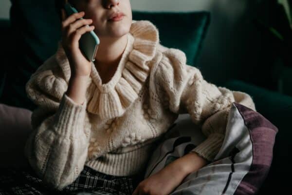 Photo: A teenager speaks on a phone in a file photo without date.