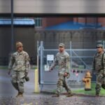 PHOTO: Members of the 49th California Military Police Brigade walk the grounds at the Oregon Army National Guard's Camp Withycombe in Happy Valley, Oregon, Oct. 22, 2025.