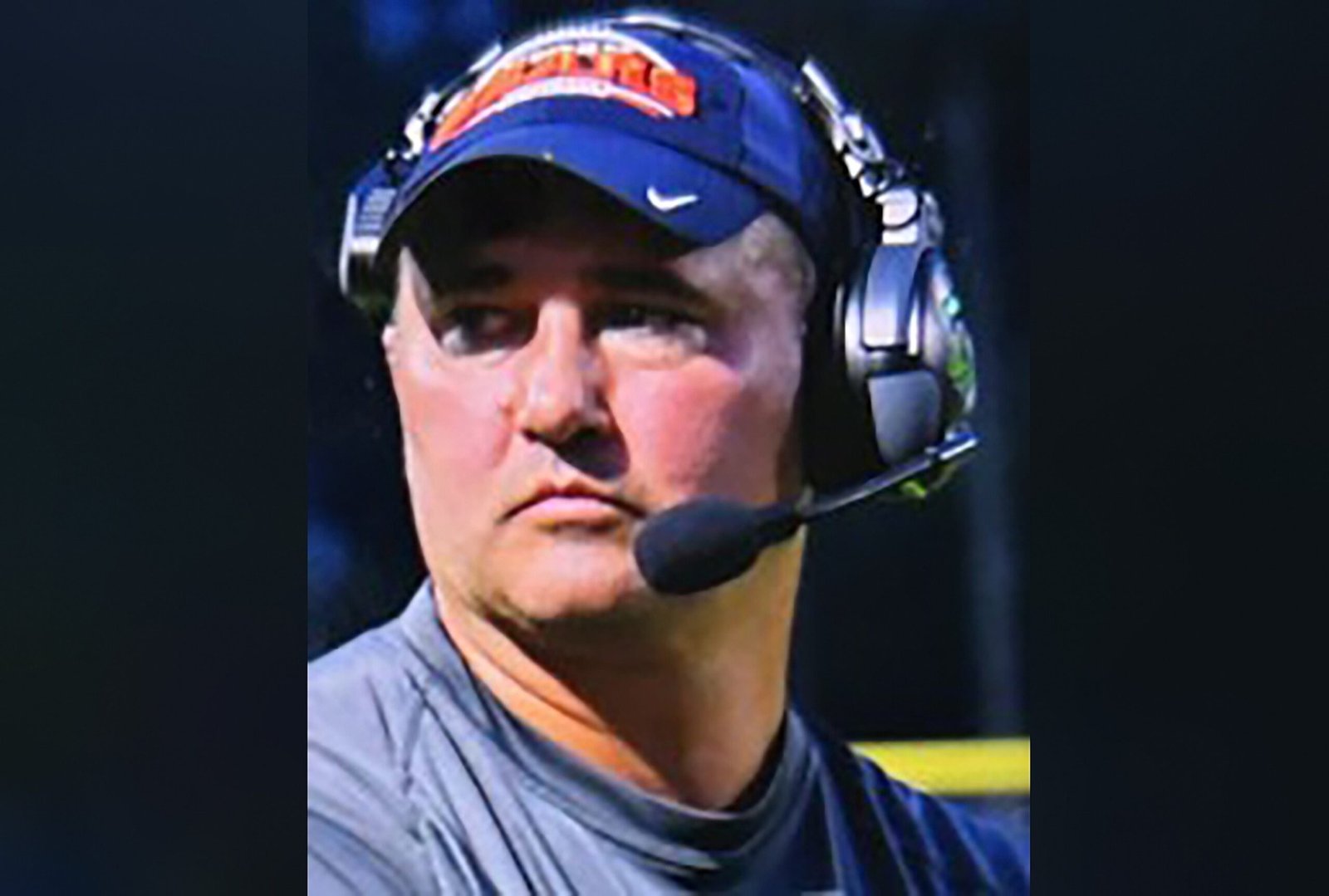 Missing Virginia football coach wanted on child sex abuse charges walked into woods with gun, family says