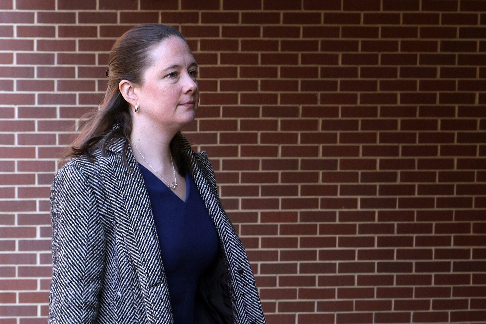 The Justice Department seeks to dismiss the lawsuit filed by former prosecutor Maurene Comey over her firing