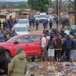 A manhunt began in South Africa after a group of robbers killed nine people in a tavern