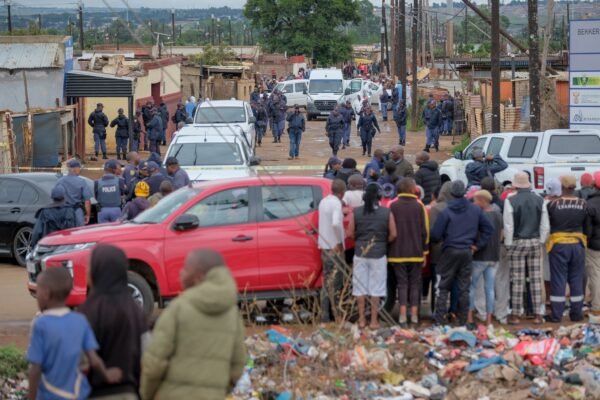 A manhunt began in South Africa after a group of robbers killed nine people in a tavern